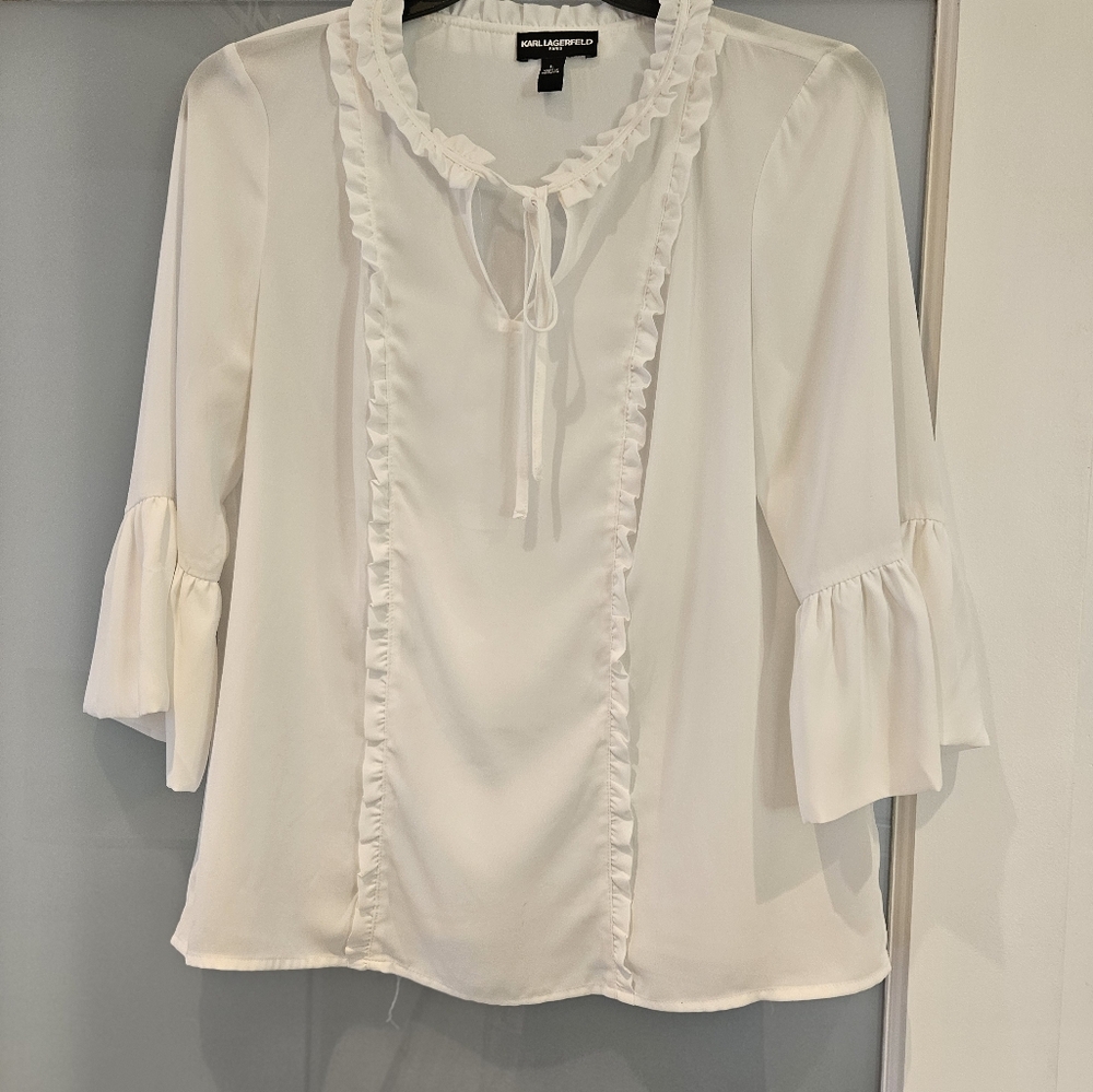 Ruffle accented, tie neck blouse